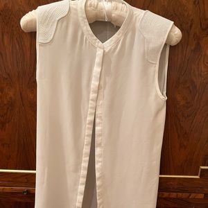 Naked Zebra Blouse - Sheer with button front and detailed trapunto shoulder.